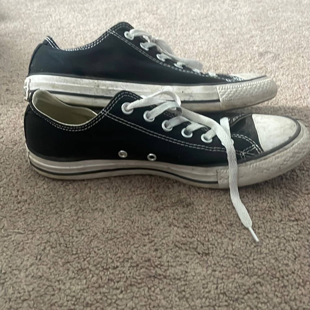 Black converse, used will wash before shipping. Women size 9